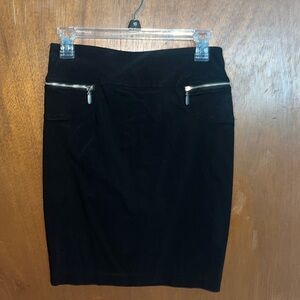 Medium length, black pencil skirts with two pockets